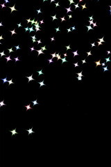 Sparkling colorful stars overlay with black background