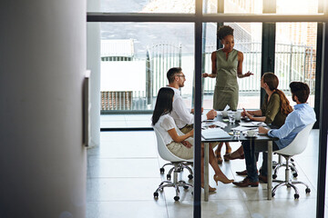 Business people, strategy meeting and presentation in boardroom for budget and financial logistics. Corporate group, teamwork and company review with speaker for discussion about audit and spending