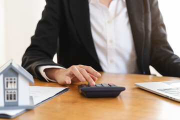 Hand of landlord, realtor pointing sign signature contract rental, purchase, buyer home or apartment with tenant, client after banker agreement mortgage, loan success or done. Property agent concept.