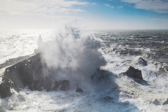 Big waves hit San Pietro church during a strong sea storm, Portovenere (Porto Venere), UNESCO World Heritage Site, La Spezia, Liguria, Italy