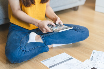 Young Asian women calculating monthly bills