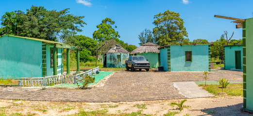 View of colourful houses in traditional Zulu village, Veyane Cultural Village, Khula, Khula Village, KwaZulu-Natal Province, South Africa