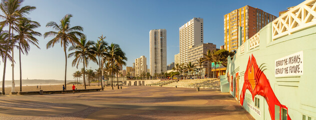 View of promenade, colourful wall art and hotels, Durban, KwaZulu-Natal Province, South Africa