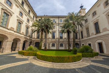 Obraz premium STRESA, ITALY, APRIL 4, 2024 - The facade of Borromeo Palace in Isola Bella, Stresa, province of Verbano-Cusio-Ossola, Piedmont, Italy.