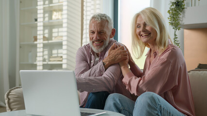 Happy senior family Caucasian couple elderly woman man talking online video call female male using...