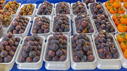 Fresh Purple Figs Fruits in Trays at Farmers Market