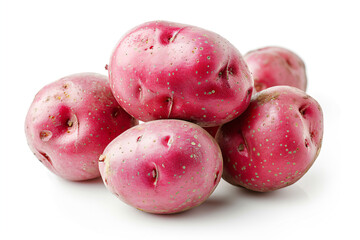 a pile of pink potatoes on a white surface