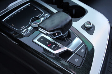 Selector automatic transmission with leather in the interior of a modern premium car. Gear shift...