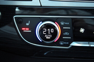 Comfortable temperature inside the car. Temperature on car dashboard display. Car Climate Control....