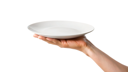 A hand carefully holds a clean white plate while another hand supports a matching empty bowl below