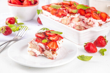 Summer strawberry tiramisu dessert, Berry fruit version of summer tiramisu cake with fresh strawberry, mascarpone and savoyardi