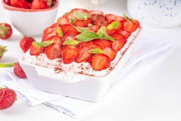 Summer strawberry tiramisu dessert, Berry fruit version of summer tiramisu cake with fresh strawberry, mascarpone and savoyardi