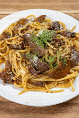 view black pepper beef fillet spaghetti at vertical composition