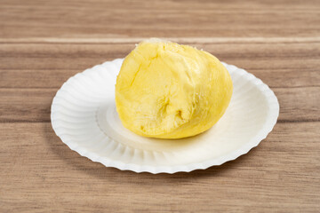 angle view piece of durian meat on a dish