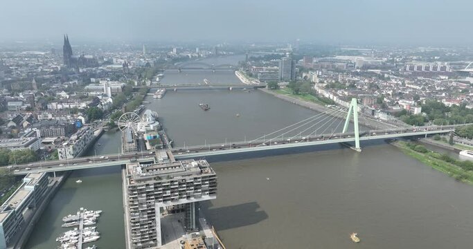 City view over Cologne, north hine westphalia, Germany at the Rheinauhafen, we see the rhine river and bridges infrastructure, city skyline, severingsbrucke, deutzer brucke and the sudbrucke and the