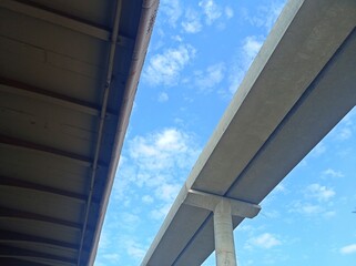 Underpass and Elevated Roadway Against a Blue Sky