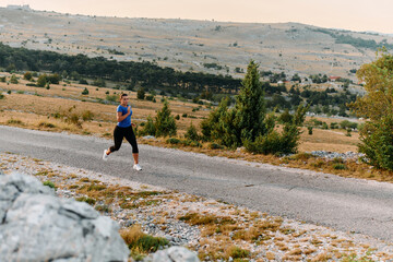 Empowered Runner Embracing Nature's Beauty on a Serene Morning Trail.