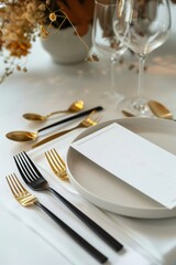Stylish and modern setup for a wedding lunch menu with gold cutlery and chic table decor