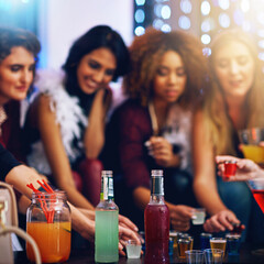 Alcohol, friends and diversity in club for party, event or nightlife, bonding and friendship with...