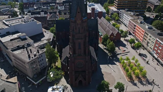 Aerial drone view of The Provost Church of St. Augustine in Heinrich K&ouml;nig Platz , Gelsenkirchen , Germany . 