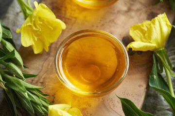 Evening primrose oil in a bowl - healthy nutritional supplement