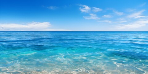 Obraz premium Tranquil Seascape: Clear Blue Skies and Calm Waters. Concept Seascape Photography, Tranquil nature, Clear blue skies, Calm waters