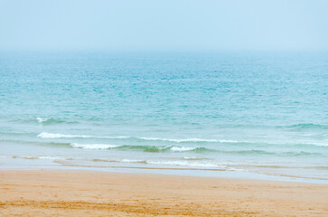 Calm Mediterranean seashore at midday