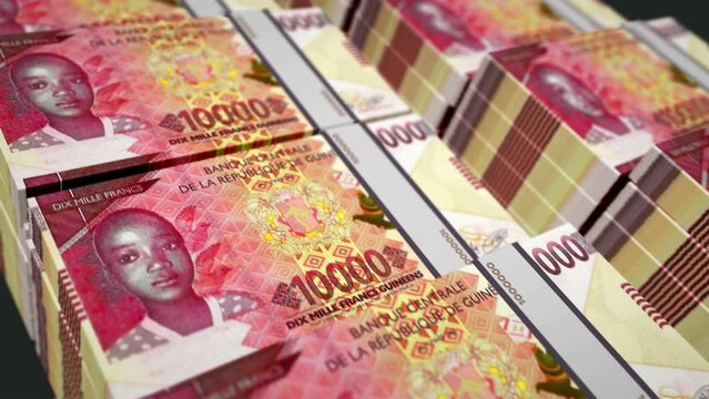 Guinea money Guinean francs pack loop 3d animation. Loopable seamless concept of finance, cash, economy, business and bank. Camera moving over GNF 10000 banknote bundle stacks.