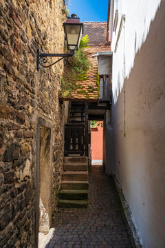 Narrow alley with a staircase in the old town of Freinsheim
