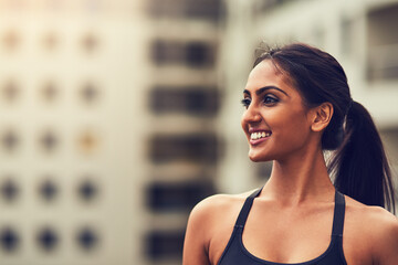 Face, Indian woman and outside for fitness, workout and activewear for cardio training. Smile,...