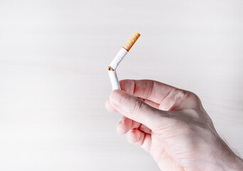 Broken Cigarette in the Hand Closeup