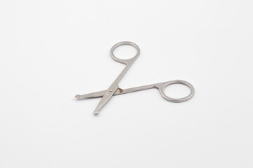 Silver metal scissors on a white background, Scissors for sewing on white background, Very sharp retro professional tailor scissors