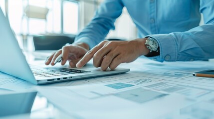 engineers pointing to building on blueprint and using laptop to drawing design building Project in office, construction concept. Engineer concept