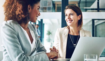 Business people, meeting and handshake by women in office with laptop for startup, profit or loan success. Partnership, congratulations and mentor shaking hands with intern for training milestone