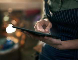 Hands, carpenter and digital tablet in workshop for planning, online inspiration and ideas with tech. Woodworker, person and research for manufacturing, creative design and information with scroll