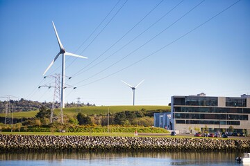 Fototapeta na wymiar Windmill along the shores for electricity generation