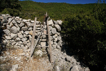 Path between stone walls on the Croatian island of Cres.