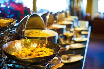 People hand grab delicious asian food in hotel seminar room