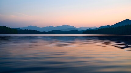 Naklejka premium Tranquil Twilight Lake Reflections Enchant with Distant Mountains