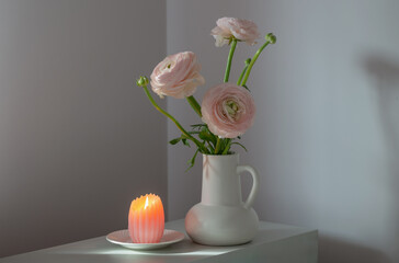 spring flowers in vase in white modern interior