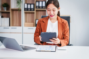Asian businesswoman specializing in stock market and financial services, including roles as a loan...