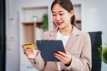 Asian businesswoman specializing in stock market and financial services, including roles as a loan...