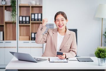 Asian businesswoman specializing in stock market and financial services, including roles as a loan...
