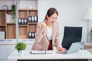 Asian businesswoman specializing in stock market and financial services, including roles as a loan...