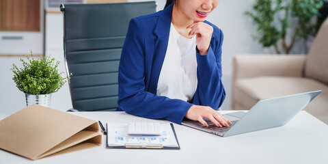 Asian businesswoman specializing in stock market and financial services, including roles as a loan...