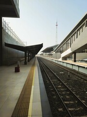 train station, railway tracks for train lines, the station was still quiet in the morning