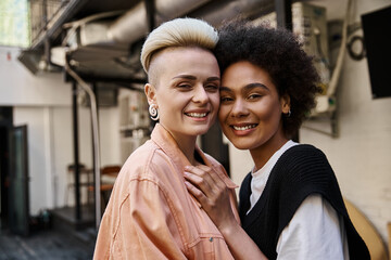 Diverse, beautiful lesbian couple enjoying a date in a cafe.