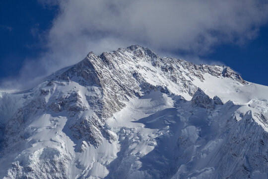 Nanga Parbat, meaning "naked mountain" in Urdu and locally called Diamer, or "King of the Mountains," Located just southeast of the northernmost bend of the Indus River in Pakistan's Gilgit-Baltistan.