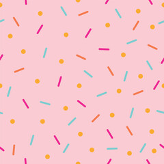 seamless pattern with sweet colorful sprinkles on pink background, vector illustration