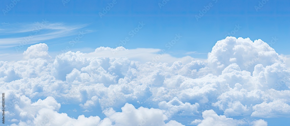 Poster The alternating blue sky and white clouds can serve as the background image. copy space available